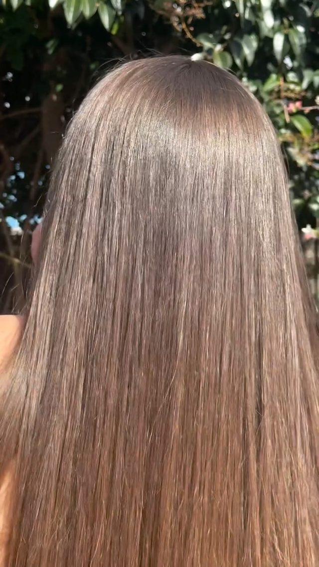 Long, glossy hair in the sun after wash day